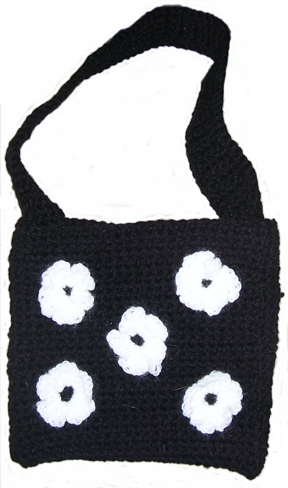 Black crocheted handbag with white crocheted flowers